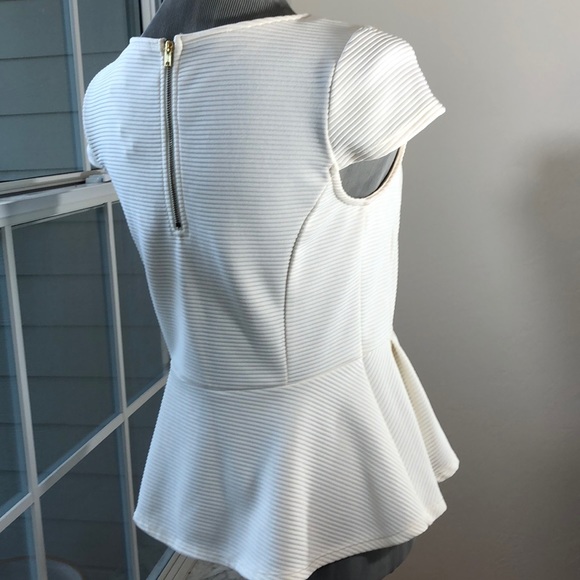 Striking Architectural Peplum Top - Picture 4 of 10